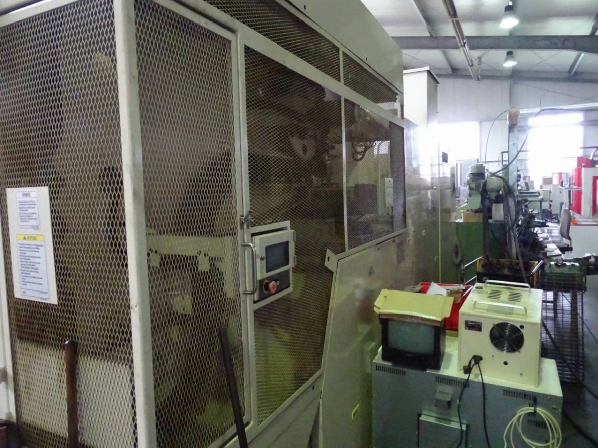 Токарно фрезерный станок с ЧПУ OKUMA MacTurn 50 фото на Industry-Pilot