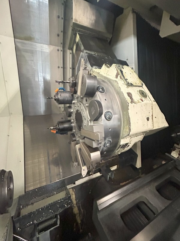 CNC Turning Machine OKUMA Genos L 300E MY x 1000 photo on Industry-Pilot