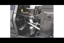 Прутковый токарный автомат продольного точения Tornos AS14 Stangenlademagazin фото на Industry-Pilot