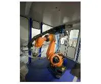 Сварочный робот Schleifzelle mit KUKA Roboter KR 180 фото на Industry-Pilot