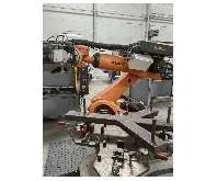 روبوتات طحن وقطع Schleif-und Schneidroboter Kuka KR 210 R2700 prime mit Drehtisch الصورة على Industry-Pilot