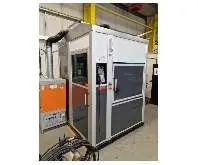  Schweißroboter Eine Zelle mit einem FANUC Arc Mate 100iD Schweißroboter Bilder auf Industry-Pilot